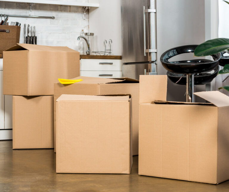 Cardboard boxes waiting to be emptied after a house move